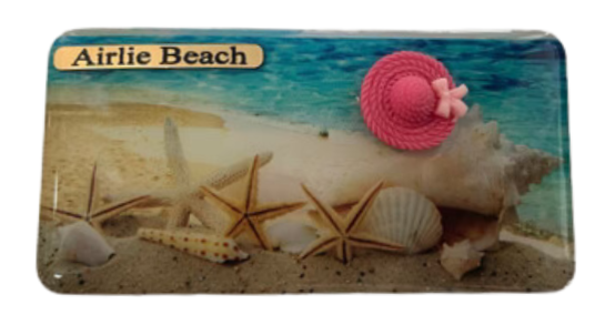 Magnet Airlie Beach Shells on Beach and Pink Hat